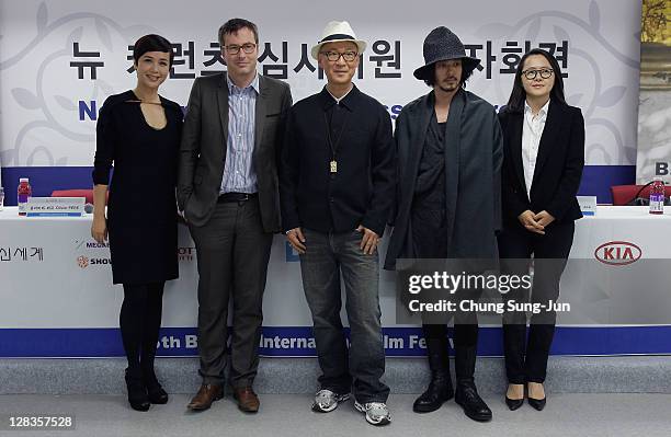 Director and actress Jiang Wenli, New Currents Jury Olivier Pere, Head of Jury Yonfan, actor Odagiri Joe and director Oh Jung-Wan attend the New...