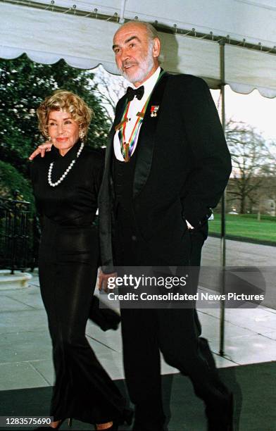 View of married couple, French-Moroccan artist Micheline Roquebrune Connery and Scottish actor Sean Connery as they arrive at the White House,...