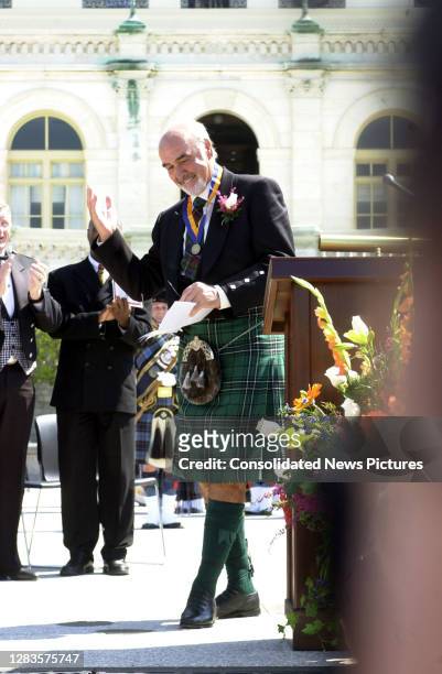 Scottish actor Sir Sean Connery acknowledges applause after receiving the American-Scottish Foundation's William Wallace Award outside the US Capitol...