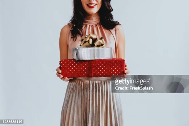 anonymous woman holding christmas presents, a close up - glamour presents stock pictures, royalty-free photos & images