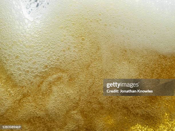 close up frothy beer - fresh deals fotografías e imágenes de stock