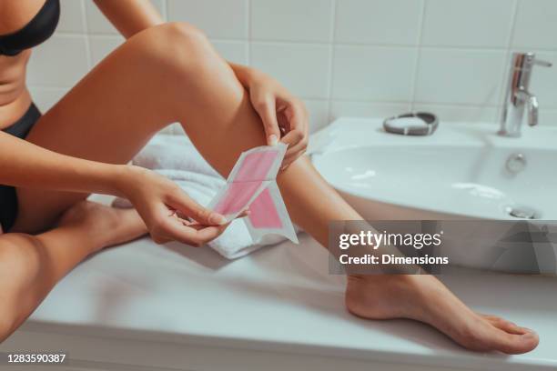 waxing is so worth it - leg waxing stock pictures, royalty-free photos & images