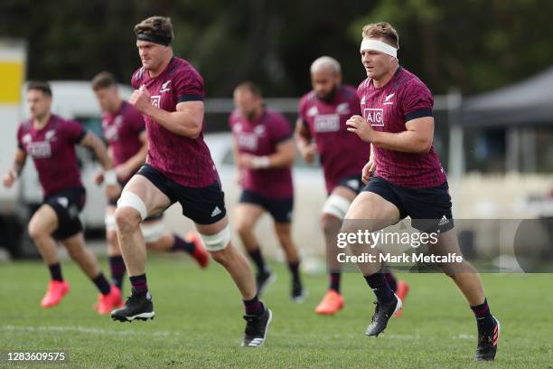 Sam Cane and Scott Barrett of the All Blacks run during a New Zealand All Blacks team training session at Sydney University on November 03, 2020 in...