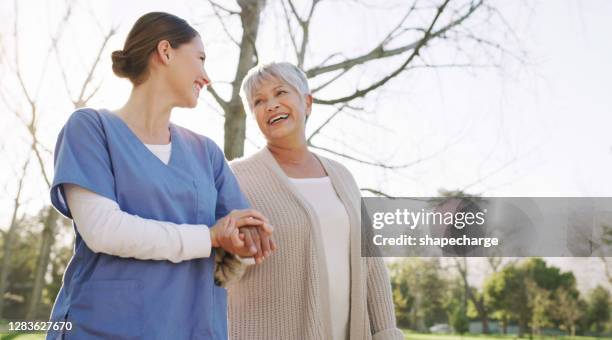 with fresh air comes fun - nurse walking stock pictures, royalty-free photos & images