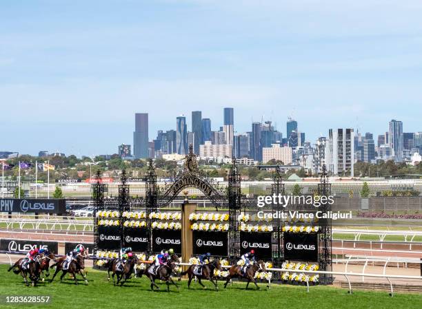 Jockey Jye McNeil riding Twilight Payment to win Race 7, the Lexus Melbourne Cup, during 2020 Lexus Melbourne Cup Day at Flemington Racecourse on...