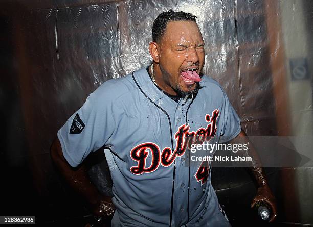 Jose Valverde of the Detroit Tigers celebrates in the locker room after the Tigers won 3-2 against the New York Yankees during Game Five of the...