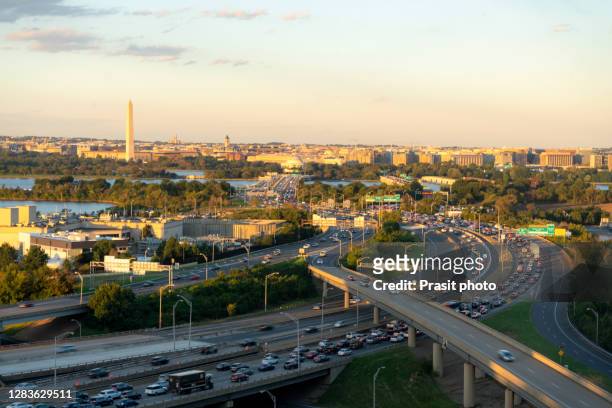 top view of washington dc downtown skyline and traffic with united states capitol, washington monument, lincoln memorial and thomas jefferson memorial in usa. - washington dc stockfoto's en -beelden