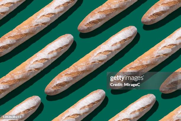 baguette long loaf arrangement pattern - carcaça imagens e fotografias de stock