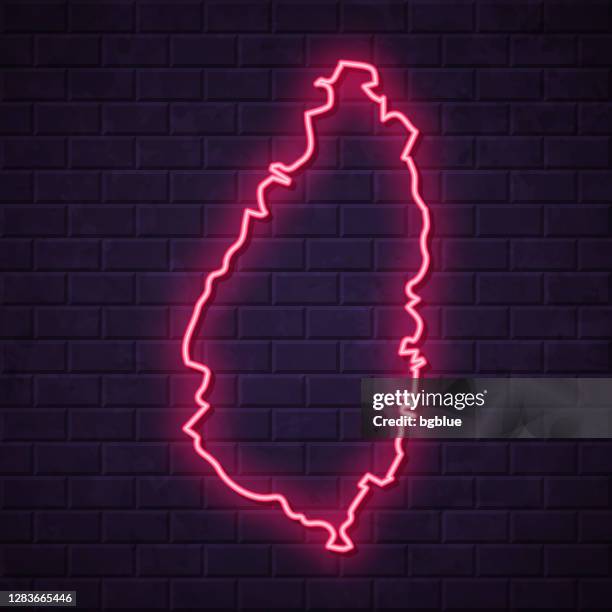 saint lucia map - glowing neon sign on brick wall background - billboard uk stock illustrations