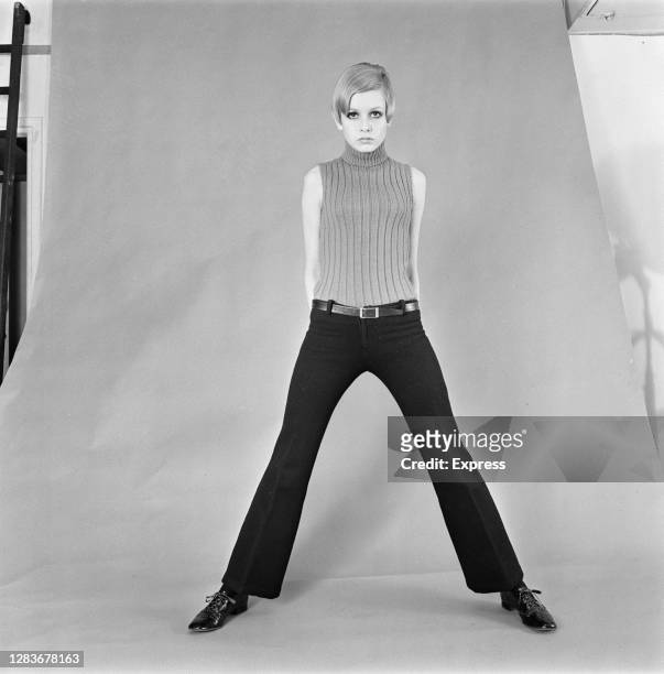 English model Twiggy in a pair of dark belted trousers, 21st February 1966.