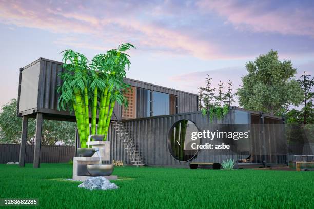 contemporary cargo container house with garden - temporary office stock pictures, royalty-free photos & images