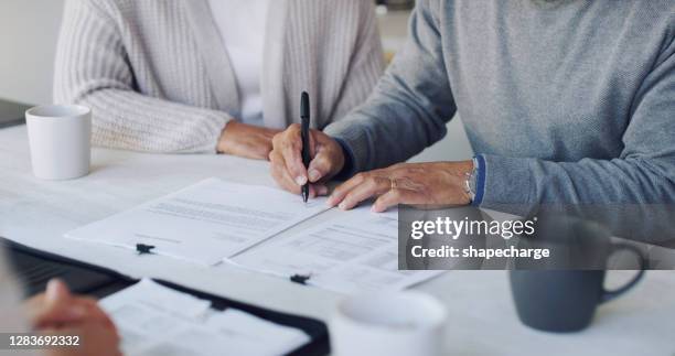 signing up for a secure future - document stock pictures, royalty-free photos & images