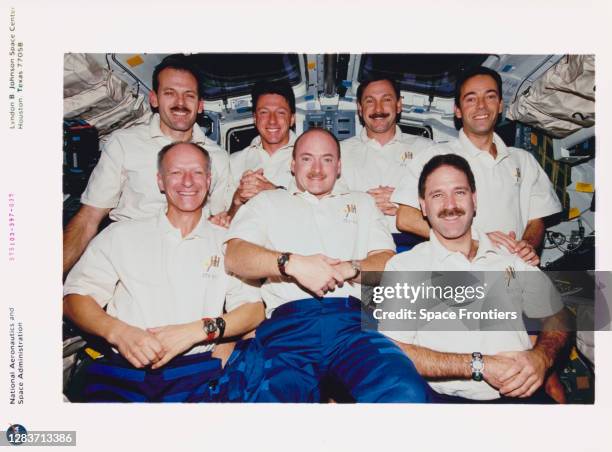 The seven crew members of Space Shuttle Discovery mission STS-103 pose for the traditional inflight crew portrait, 20th-28th December 1999. STS-103...