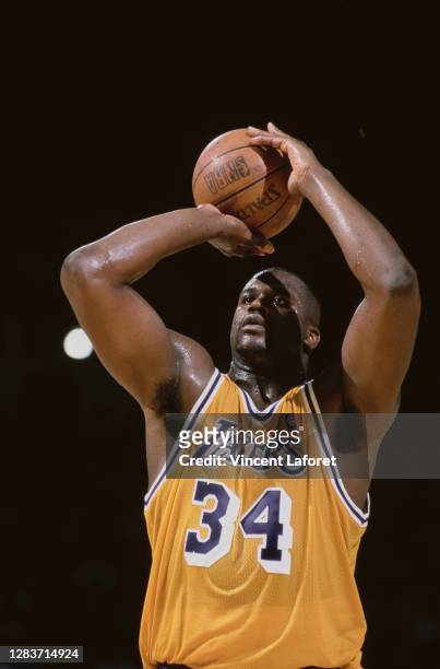 Shaquille O'Neal, Center for the Los Angeles Lakers prepares to shoot a free throw during the NBA Pacific Division basketball game against the Dallas...