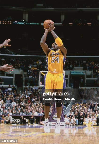 Horace Grant, Power Forward for the Los Angeles Lakers jumps to shoot for the basket during the NBA Pacific Division basketball game against the...