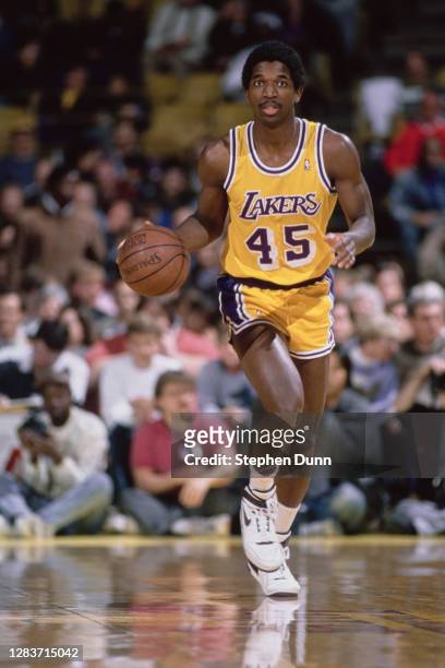 Green, Power Forward for the Los Angeles Lakers dribbles the basketball down court during the NBA Pacific Division basketball game against the...