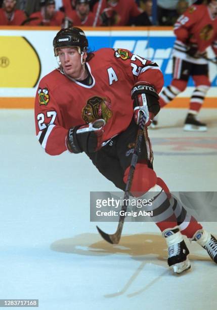 Jeremy Roenick of the Chicago Blackhawks skates against the Toronto Maple Leafs during 1993-1994 NHL playoff game action at Maple Leaf Gardens in...