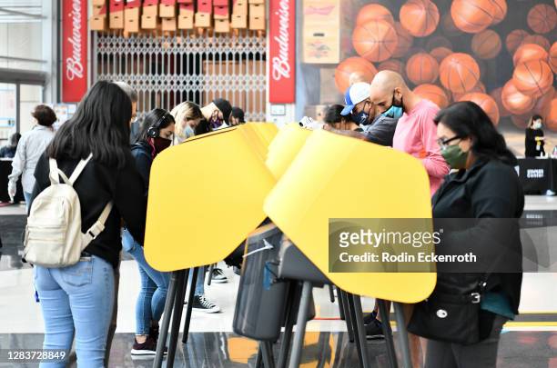 Voters cast their ballots at Staples Center on November 03, 2020 in Los Angeles, California.
