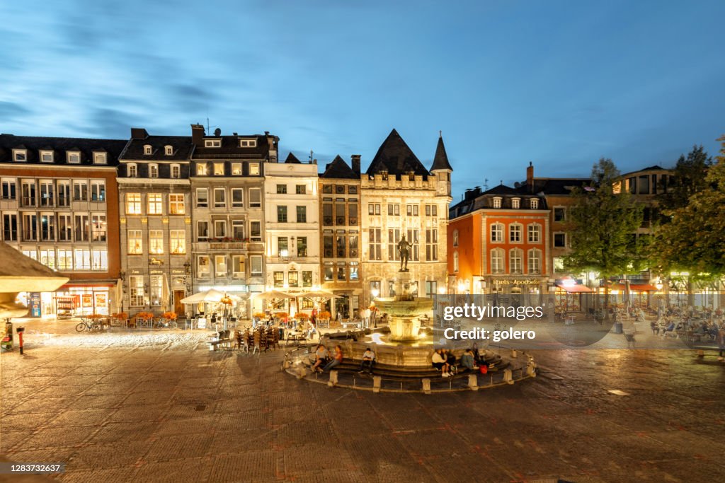 Illuminated market square of Aachen at blue hour