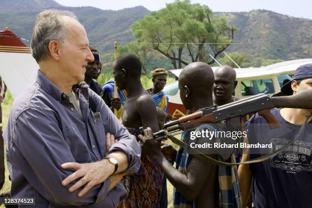 German director Werner Herzog with people from the Mursi tribe of southwest Ethiopia, during the making of his short film 'La Boheme', 2009. Set to...