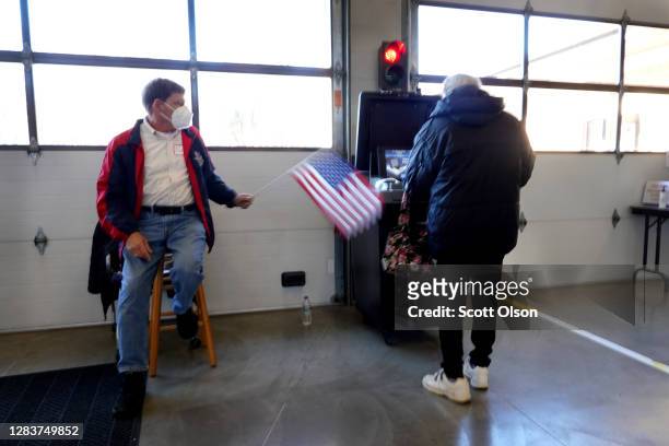 Resident casts her vote at the Town of Beloit fire station on November 03, 2020 near Beloit, Wisconsin. After a record-breaking early voting turnout,...