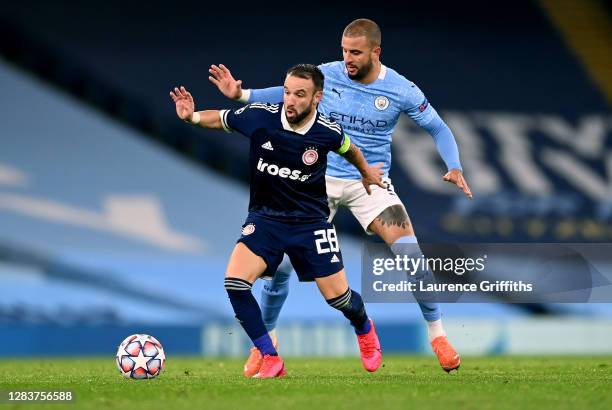 Mathieu Valbuena of Olympiacos and Kyle Walker of Manchester City during the UEFA Champions League Group C stage match between Manchester City and...