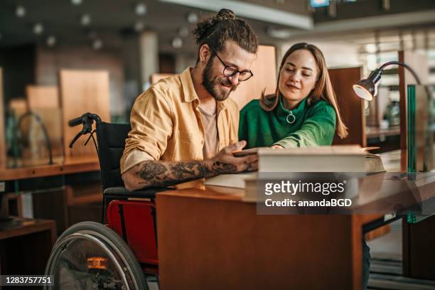 student in wheelchair - physical disability stock pictures, royalty-free photos & images