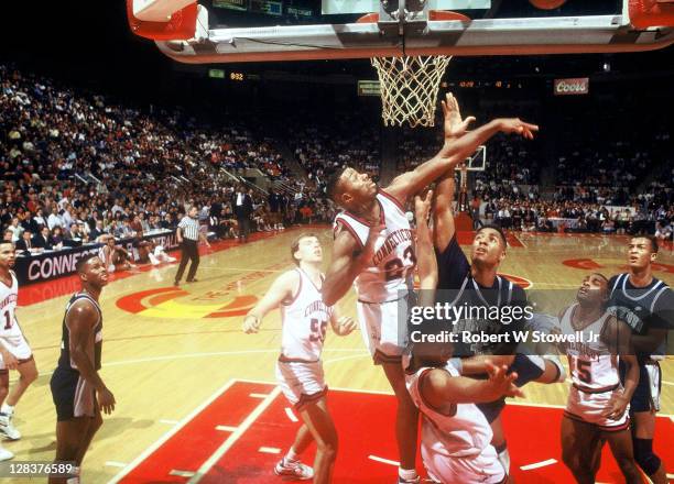 UConn's Lyman DePriest rejects a shot by Georgetown's center Alonzo Mourning, during a Big East game in Hartford CT 1991.