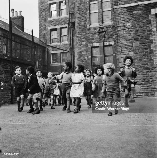 Children of various ethnic backgrounds at a school in Cardiff, south Wales, circa 1955.