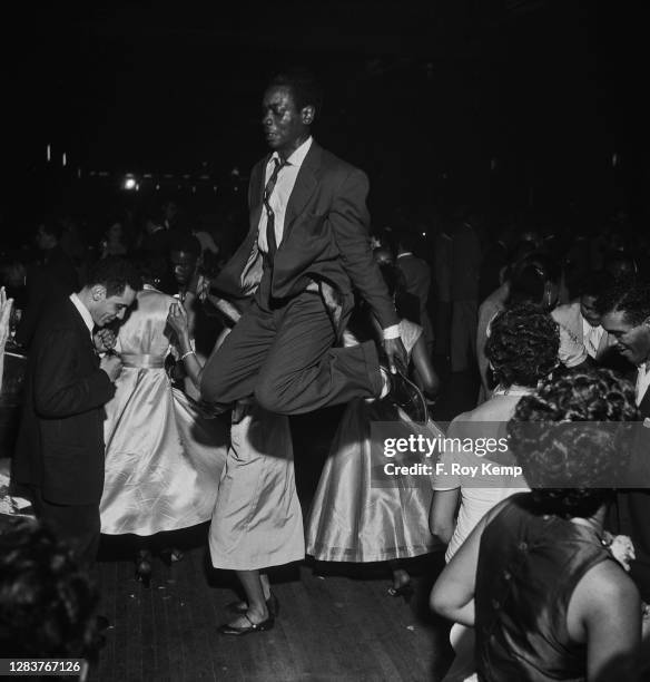 An energetic dancer at the Audubon Ballroom in Manhattan, New York City, circa 1956.