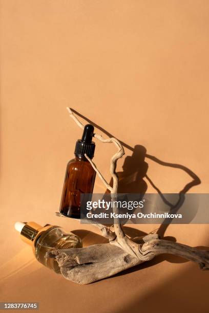 composition with bottles of essential oils on table. natural cosmetics - antiseptic cream stock pictures, royalty-free photos & images