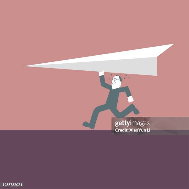 a man raised a huge paper airplane and ran. - li xiao ran stock illustrations