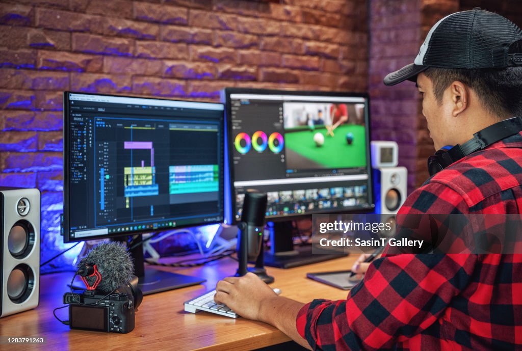 The man makes video editing. Video production.
