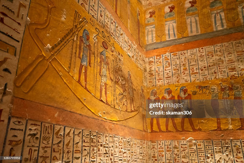 Ruin stone carving god horus and osiris , anubis at tombs in valley of the kings at luxor near Nile river egypt