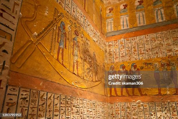 ruin stone carving god horus and osiris , anubis at tombs in valley of the kings at luxor near nile river egypt - tomb stock pictures, royalty-free photos & images
