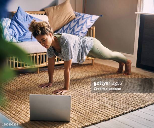 finding time for fitness is easier with home training - woman press ups stock pictures, royalty-free photos & images