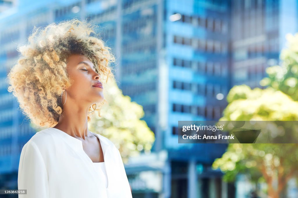 Beautiful Businesswoman Relaxing Outdoor High-Res Stock Photo - Getty ...