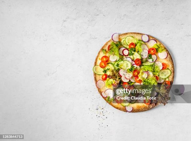 vegetarian and gluten-free pizza on white background - vegetable pizza stock pictures, royalty-free photos & images