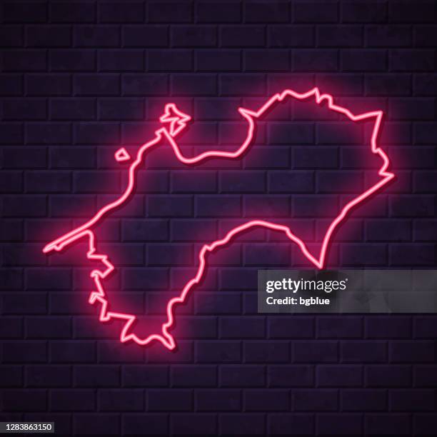 shikoku map - glowing neon sign on brick wall background - japan billboard stock illustrations