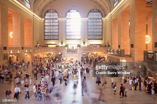 rushing commuters at grand central terminal - grand central station manhattan stock pictures, royalty-free photos & images