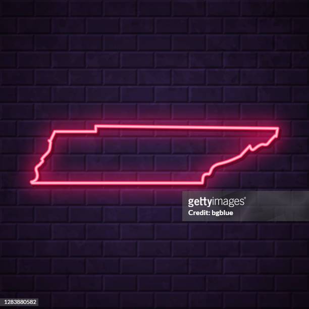 tennessee map - glowing neon sign on brick wall background - nashville night stock illustrations