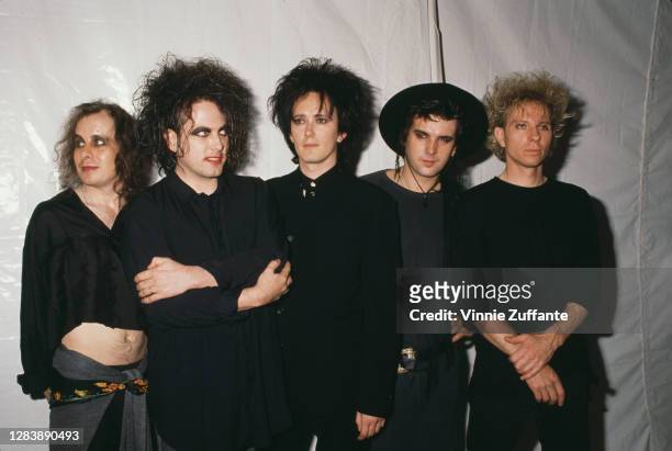 British rock band The Cure ) attend the 1989 MTV Video Music Awards, held at the Universal Amphitheatre in Los Angeles, California, 6th September...