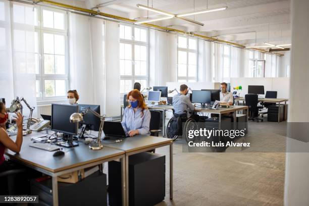 start up office reopen post pandemic - indian post office stock pictures, royalty-free photos & images