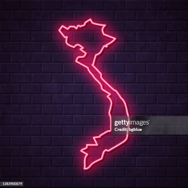 vietnam map - glowing neon sign on brick wall background - hanoi night stock illustrations