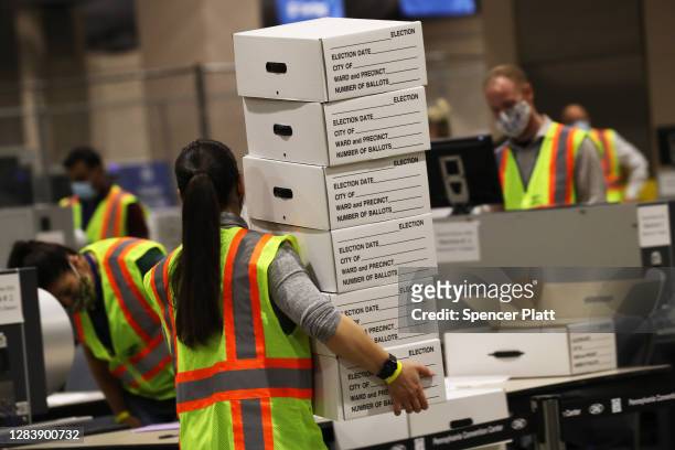 Election workers count ballots on November 04, 2020 in Philadelphia, Pennsylvania. With no winner declared in the presidential election last night,...