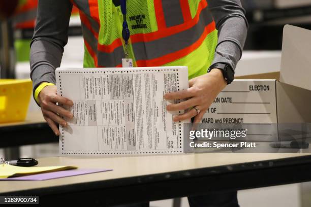 Election workers count ballots on November 04, 2020 in Philadelphia, Pennsylvania. With no winner declared in the presidential election last night,...