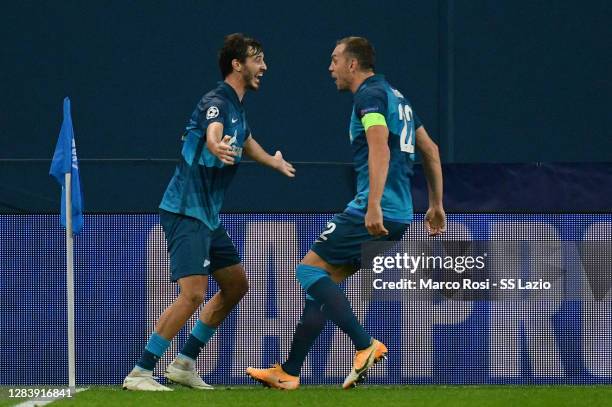 Aleksandr Erokhin of Zenit St. Petersburg celebrates the opening goal with his team-mates during the UEFA Champions League Group F stage match...