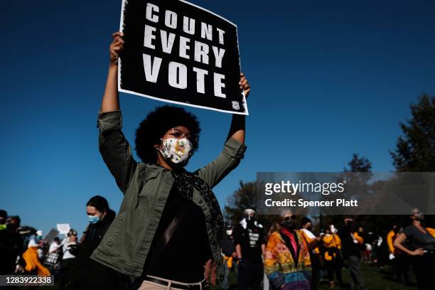 People participate in a protest in support of counting all votes as the election in Pennsylvania is still unresolved on November 04, 2020 in...