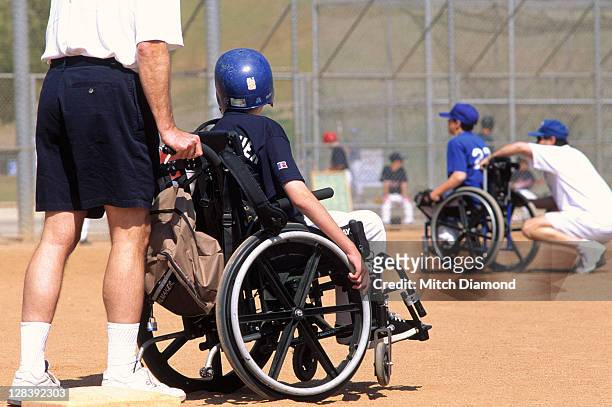 Baseball players in wheelchairs