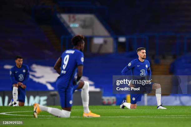 Jorginho of Chelsea takes a knee in support of the Black Lives Matter movement during the UEFA Champions League Group E stage match between Chelsea...